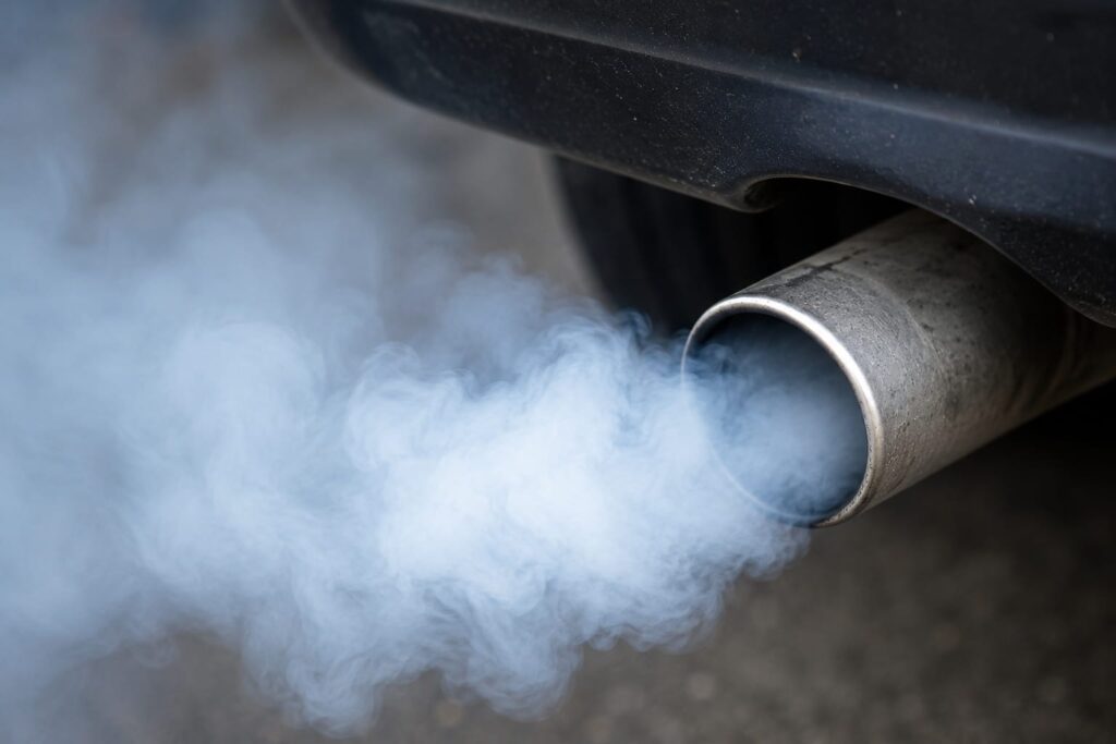 Close-up of white/blue smoke from a tailpipe